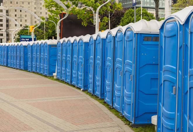 a row of portable restrooms at a fairground, offering visitors a clean and hassle-free experience in dobbin